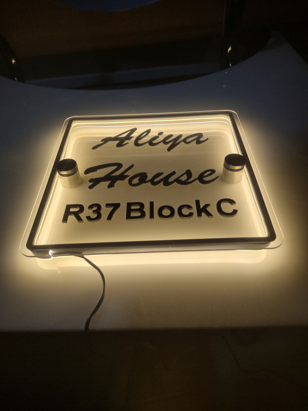 LED Neon Glow Acrylic Door Name Plate with Black 3D Letters - 12x12 Inch
