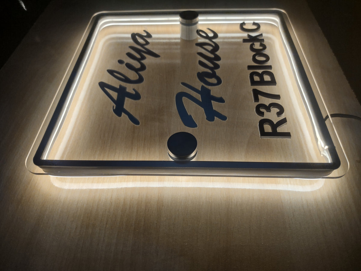 LED Neon Glow Acrylic Door Name Plate with Black 3D Letters - 12x12 Inch